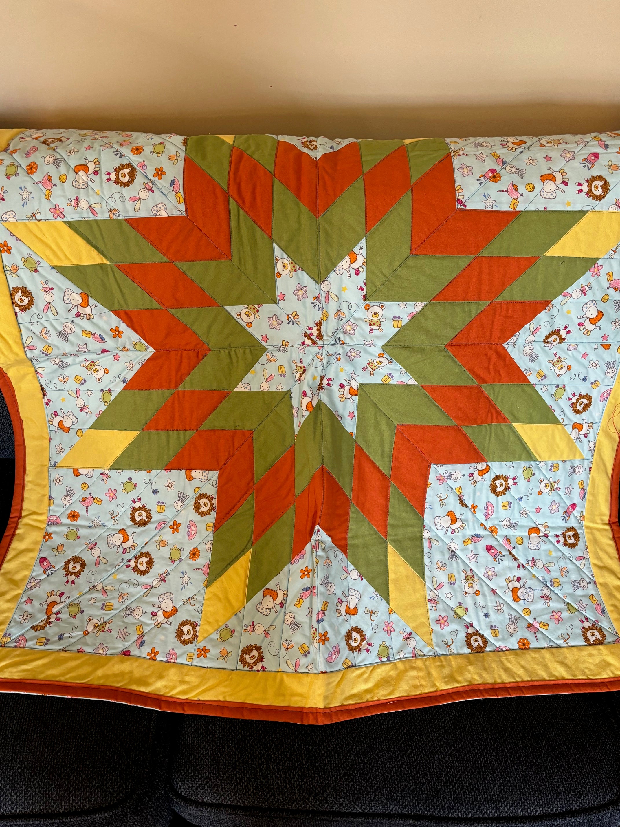 Latoya Graham Baby Star Quilt - Green and Orange