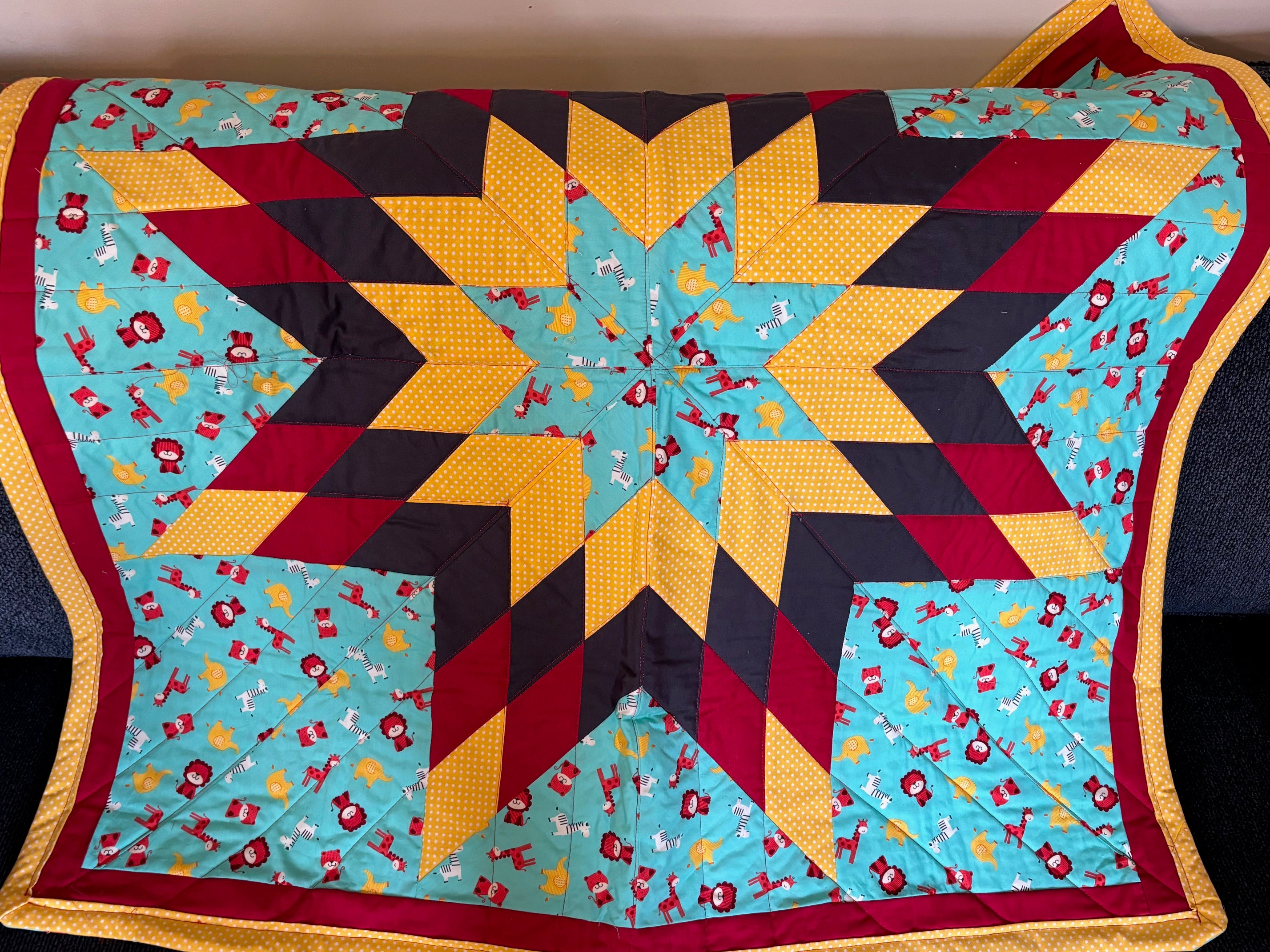 Latoya Graham Baby Star Quilt - Zebra's, Lions
